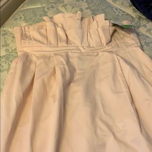 Brand new strapless dress with ruffle top